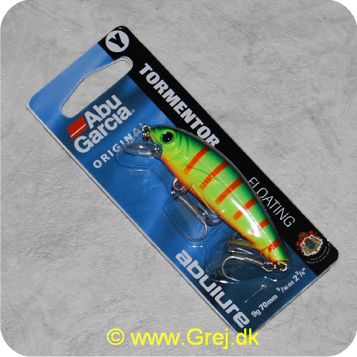 036282924871 - Tormentor wobler - 7 cm. (Blå/Grøn/Orange) (Org. titel : H-1-11-AE)<br>Tormentor er en effektiv og letkastet kystwobler, som har haft stor fremgang i den seneste år. Indbyggede raslekugler hidser fiskene til hug under indspinningen. Flash-farverne og den holografiske finish giver et naturtro indtryk, som de færreste fisk kan modstå. En wobler med et meget bredt anvendelsesområde. Fra trolling efter laks til ørredspin i vandløbet. Kan sågar "jerkes" ved geddefiskeri.